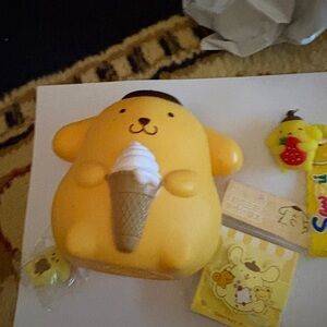 Pom Pom bank figure, mini figure, notepad and key chain bundle